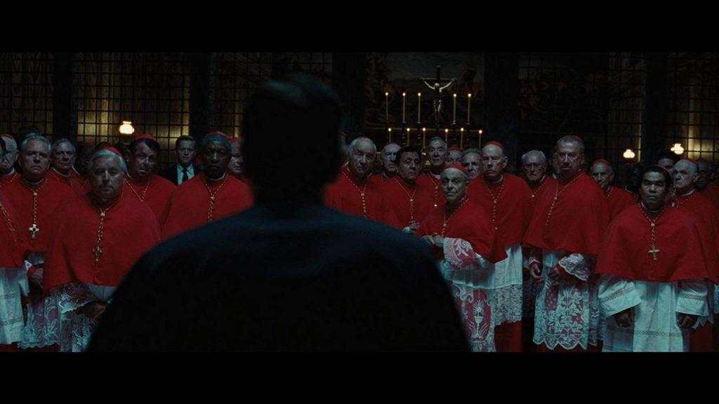 Cardinals and Father Patrick McKenna in the Sistine Chapel during conclave as seen in Angels and Demons (2009)