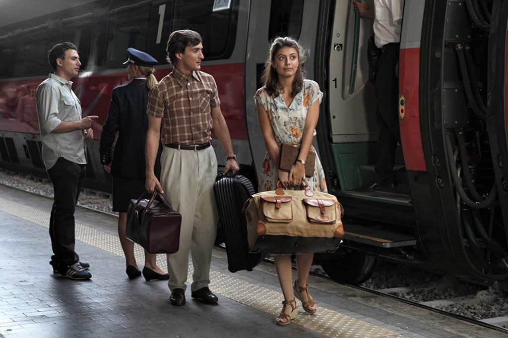 Antonio and Milly depart the train at Roma Termini Station in To Rome with Love (2012)