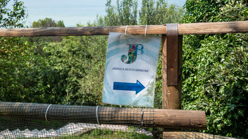 Signpost to Jamaica Beach on Sirmione, Lake Garda in Italy, a Call Me By Your Name filming location