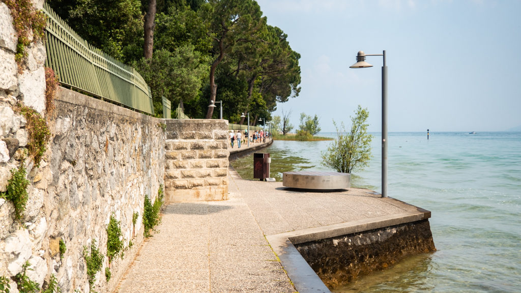 Path around Sirmione public beach on Lake Garda, Italy
