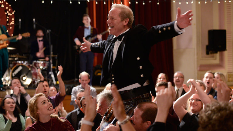 Rab at his anniversary party in Sunshine on Leith (2013)