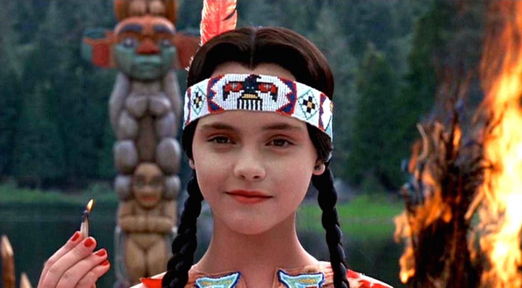 Addams Family Values (1993) film still of Wednesday Addams as a Native American in a play