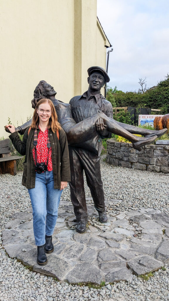 Ginger lady with The Quiet Man Statue in Cong, Ireland