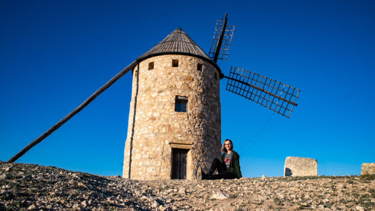 Almost Ginger blog owner with windmills in Belmonte, Castilla-La Mancha in Spain