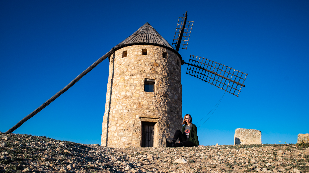 Almost Ginger blog owner with windmills in Belmonte, Castilla-La Mancha in Spain