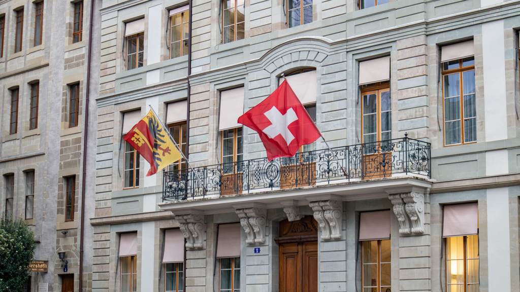 Swiss Flag on a building in Geneva, Switzerland
