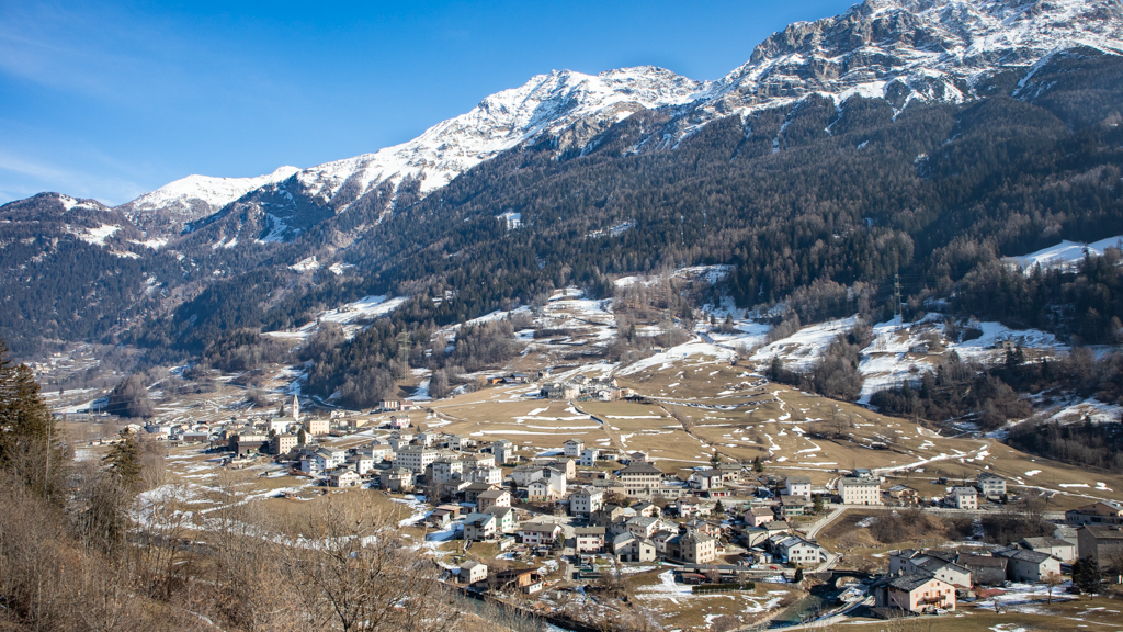 Town in the Swiss Alps from the Bernina Express train in Switzerland