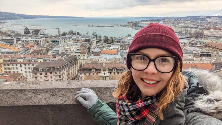 Almost Ginger blog owner at St Pierre Cathedral with a view of the city spending one day in Geneva, Switzerland
