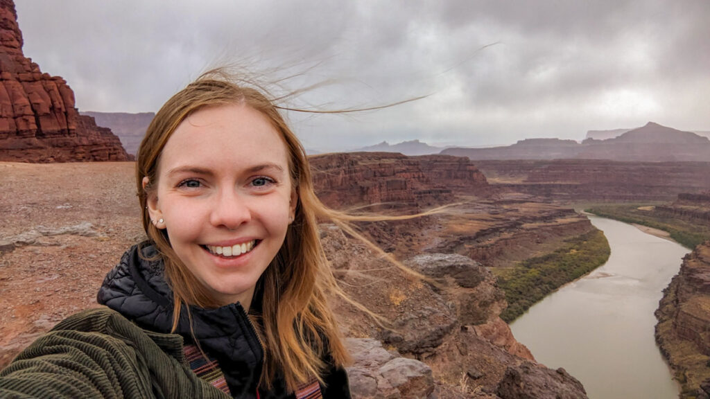 Woman at Thelma & Louise Point in Canyonlands National Park in Moab, Utah