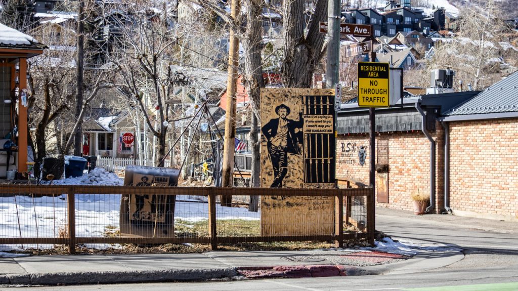 Robert Redford as the Sundance Kid on a sign in Park City