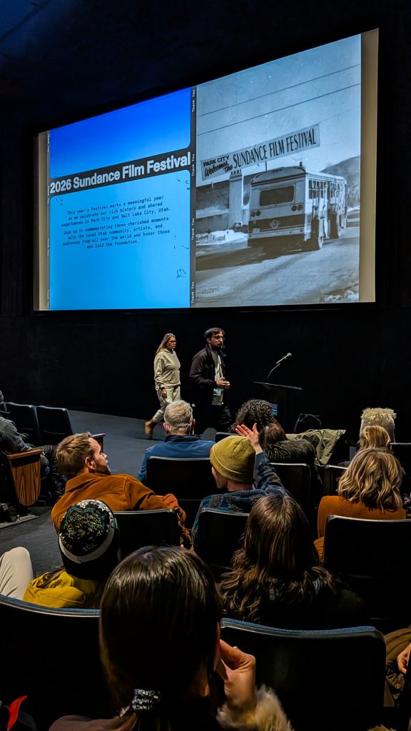 Screen and audience at a Sundance Film Festival screening in Park City, Utah